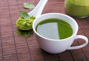 bigstock-green-tea-matcha-in-a-cup-on-t-97334930